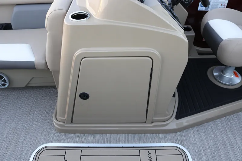 Slide: The Image of 2026 SunChaser Eclipse 23 SB DH boat interior with beige console and seating. - 15