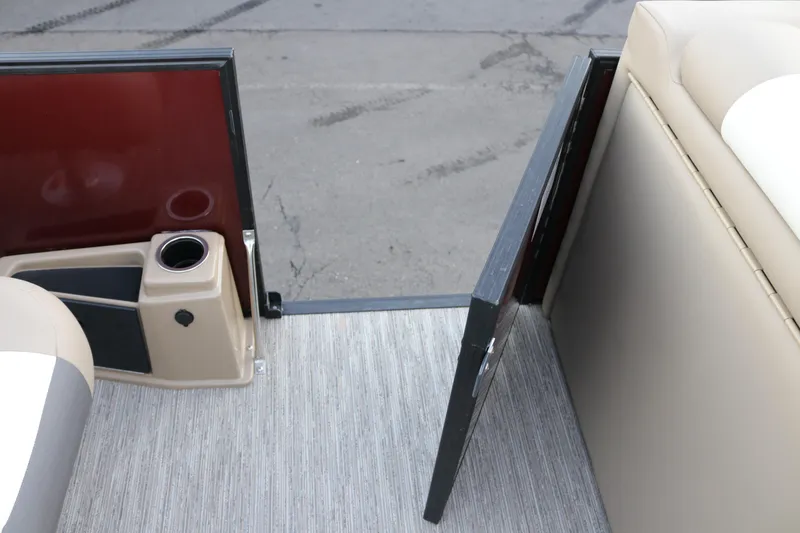 Slide: The Image of Open door on 2026 SunChaser Eclipse 23 SB DH boat, showing interior seating and flooring. - 27