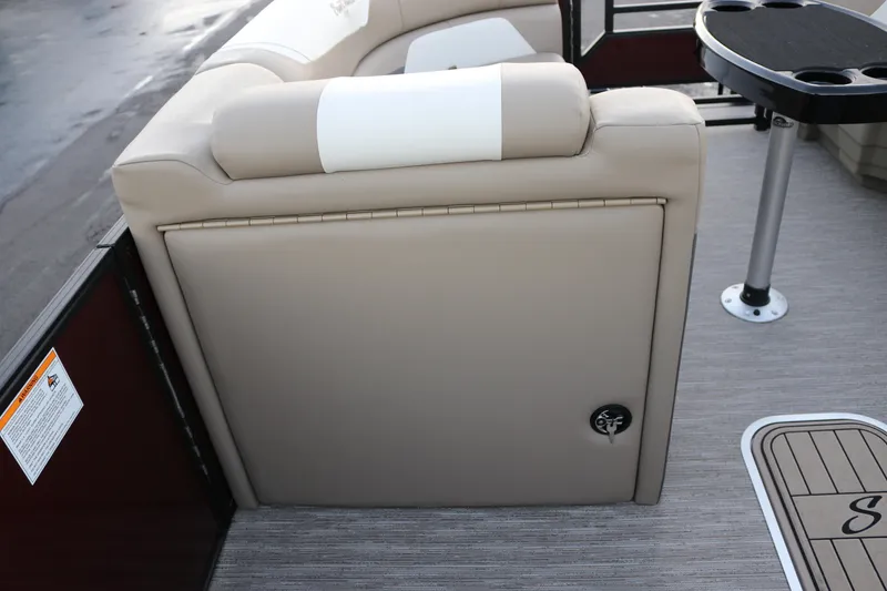 Slide: The Image of 2026 SunChaser Eclipse 23 SB DH boat interior with beige seating and table. - 29