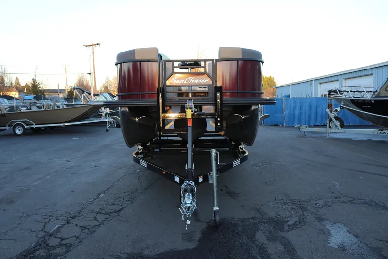 Slide: The Image of 2026 SunChaser Eclipse 23 SB DH pontoon boat on trailer in outdoor lot. - 3