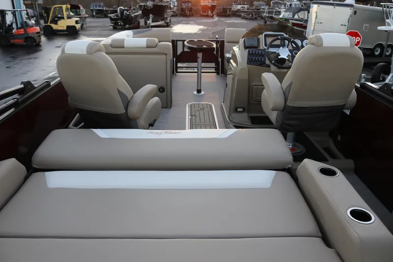 Slide: The Image of Luxurious interior of 2026 SunChaser Eclipse 23 SB DH pontoon boat with plush seating. - 8