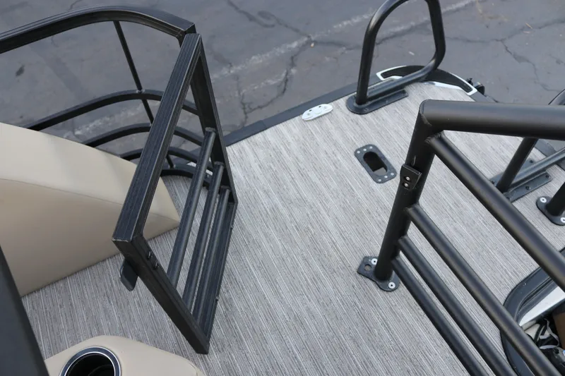 Slide: The Image of SunChaser Eclipse 23 SB DH 2026 boat deck with open gate and beige seating. - 9