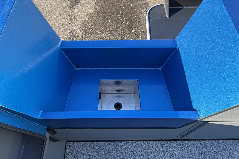 Slide: The Image of Blue storage compartment in 2026 Alumaweld Intruder Outboard 22 boat. - 25