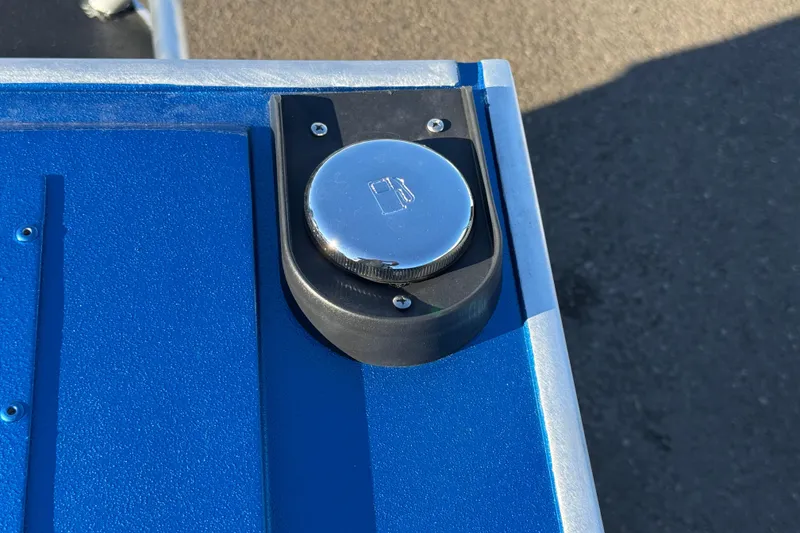Slide: The Image of Fuel cap on 2026 Alumaweld Intruder Outboard 22, blue exterior detail. - 37