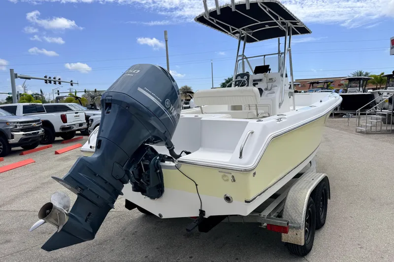 Slide: The Image of 2007 Sea Hunt Triton 220 boat on trailer with Yamaha outboard motor. - 5