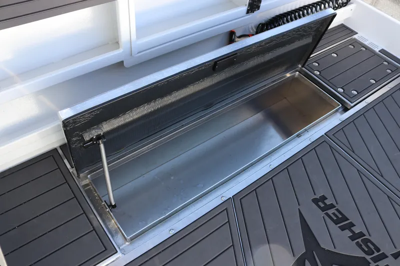 Slide: The Image of Open storage compartment on 2026 KingFisher 3425 GFX Offshore boat deck. - 28