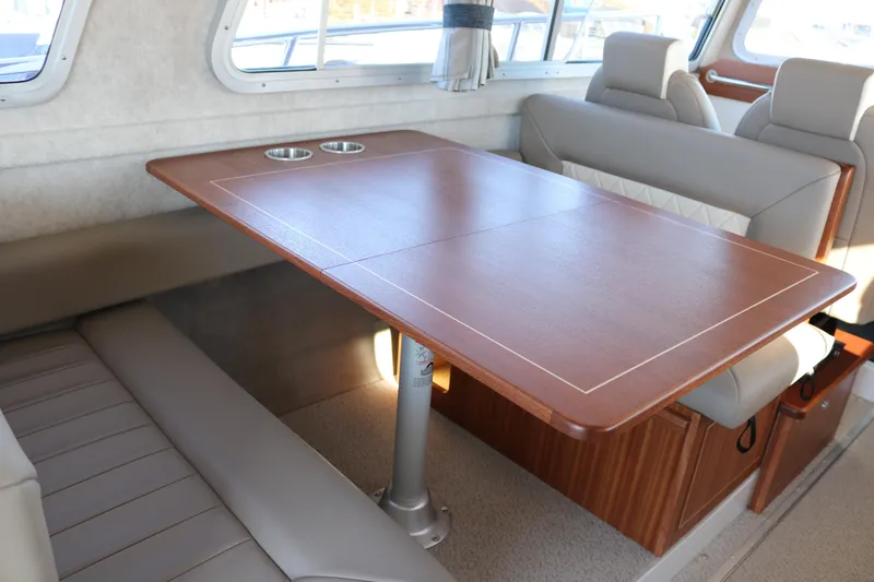Slide: The Image of Luxurious interior of 2026 KingFisher 3425 GFX Offshore boat with elegant dining area. - 33