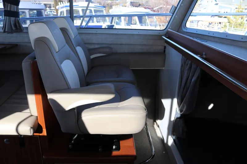 Slide: The Image of Interior of 2026 KingFisher 3425 GFX Offshore boat with comfortable seating. - 37