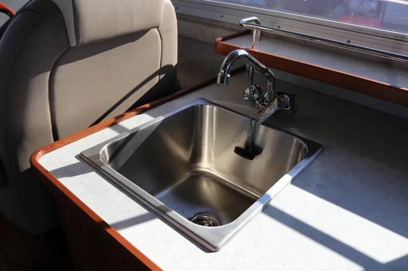 Slide: The Image of Stainless steel sink in 2026 KingFisher 3425 GFX Offshore boat interior. - 40