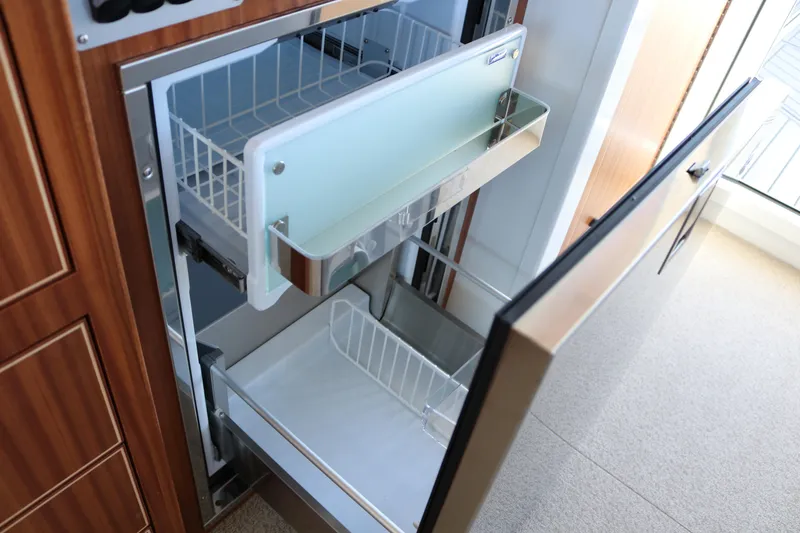 Slide: The Image of Open drawer refrigerator in 2026 KingFisher 3425 GFX Offshore boat interior. - 41