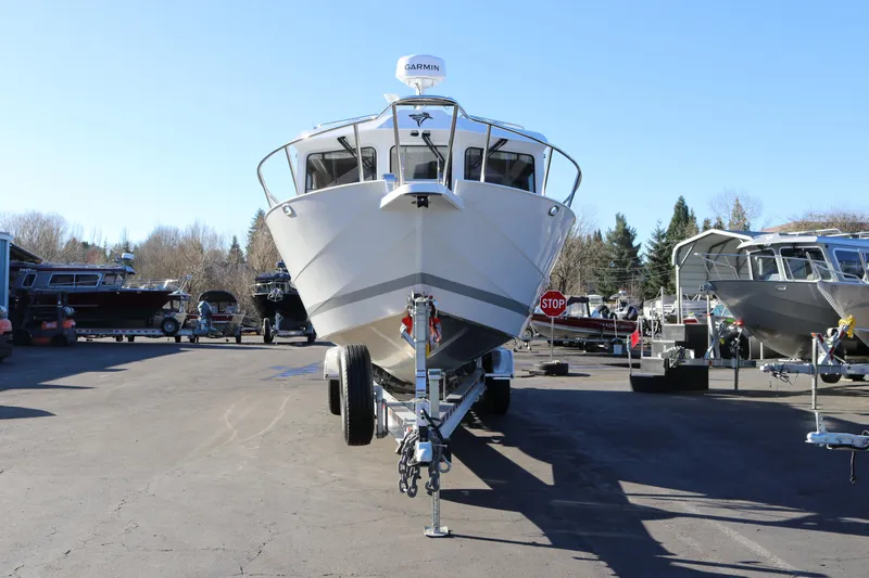 Slide: The Image of 2026 KingFisher 3425 GFX Offshore boat on trailer in outdoor lot. - 6