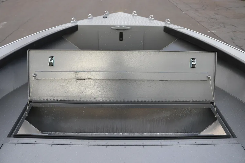 Slide: The Image of Open storage compartment on 2026 Alumaweld Columbia 23 boat deck. - 14
