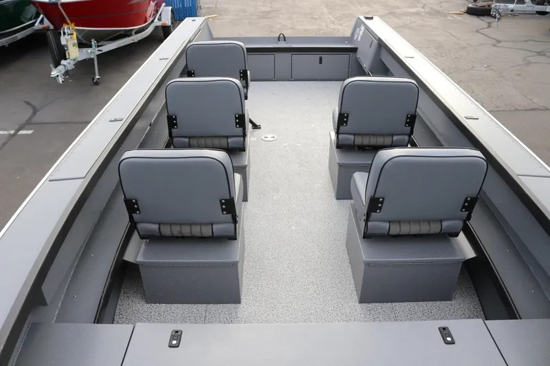 Slide: The Image of 2026 Alumaweld Columbia 23 boat interior with gray seating and spacious layout. - 15