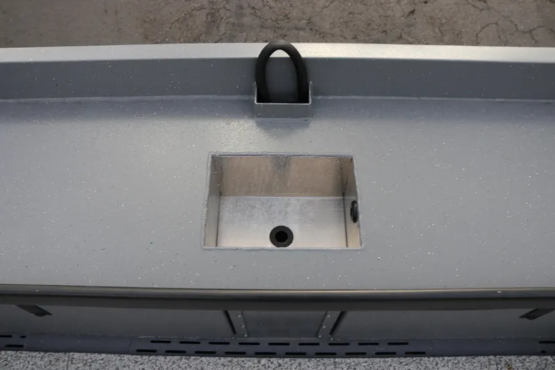 Slide: The Image of Alumaweld Columbia 23 (2026) boat deck with built-in compartment. - 18