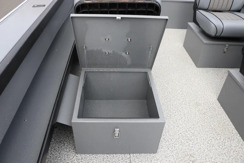 Slide: The Image of Open storage compartment on 2026 Alumaweld Columbia 23 boat interior. - 30