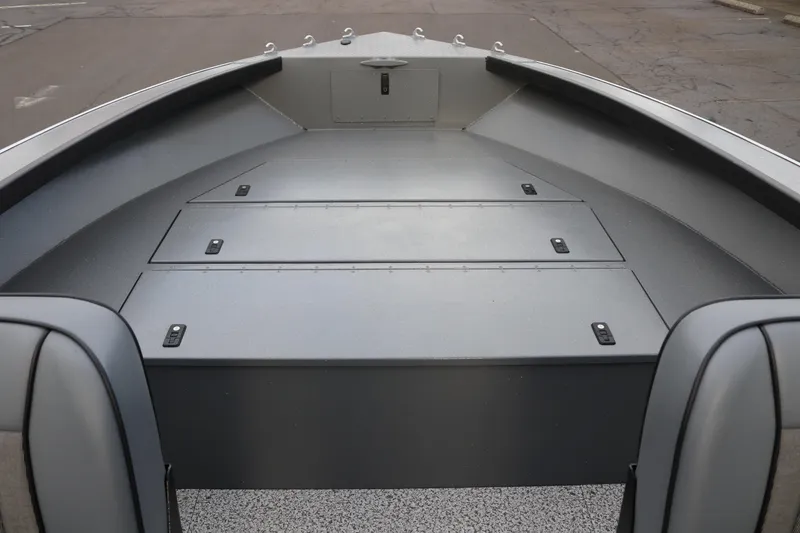 Slide: The Image of 2026 Alumaweld Columbia 23 boat interior with storage compartments, showcasing sleek design. - 8