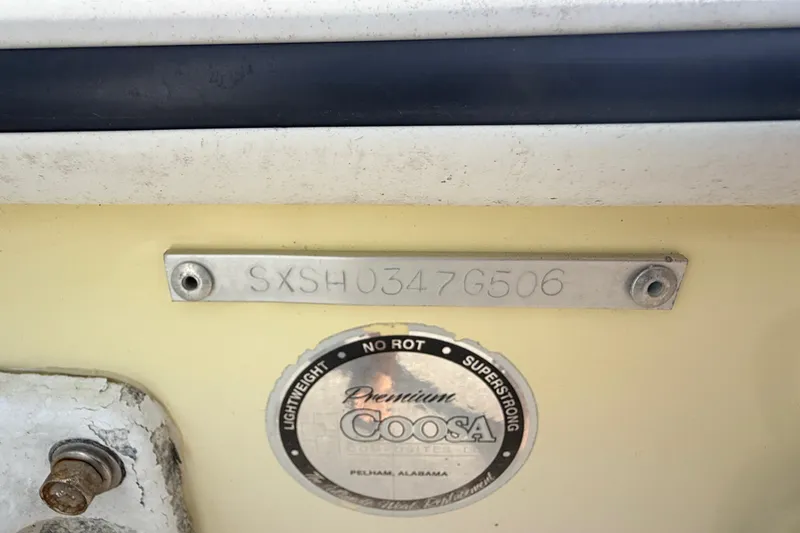 Slide: The Image of 2006 Sea Hunt Triton 220 boat identification plate and Coosa composite label. - 23