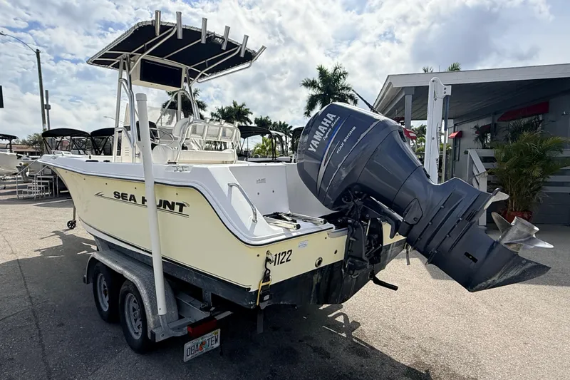 Slide: The Image of 2006 Sea Hunt Triton 220 boat with Yamaha outboard motor on trailer. - 9