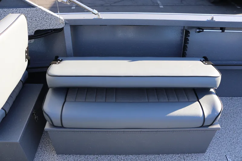 Slide: The Image of 2026 Alumaweld Intruder Outboard 20 boat interior with gray cushioned seating. - 10