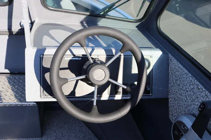 Slide: The Image of Steering wheel of 2026 Alumaweld Intruder Outboard 20 boat, featuring modern design. - 13