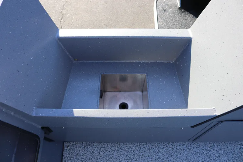 Slide: The Image of 2026 Alumaweld Intruder Outboard 20 boat interior detail with built-in compartment. - 19