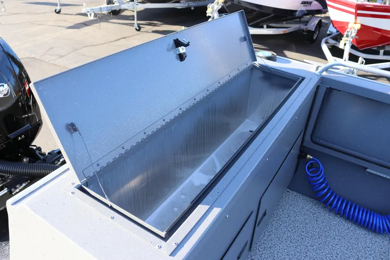 Slide: The Image of Open storage compartment on 2026 Alumaweld Intruder Outboard 20 boat. - 20