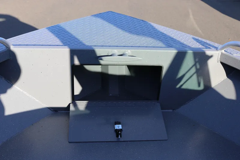Slide: The Image of 2026 Alumaweld Intruder Outboard 20 boat interior with storage compartment and diamond plate flooring. - 32