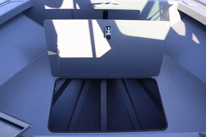 Slide: The Image of 2026 Alumaweld Intruder Outboard 20 boat interior storage compartment. - 33