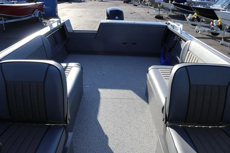 Slide: The Image of 2026 Alumaweld Intruder Outboard 20 boat interior with spacious seating and modern design. - 34