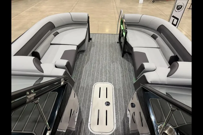Slide: The Image of Interior of 2026 Premier 250 Solaris Sport boat with sleek seating and modern design. - 11