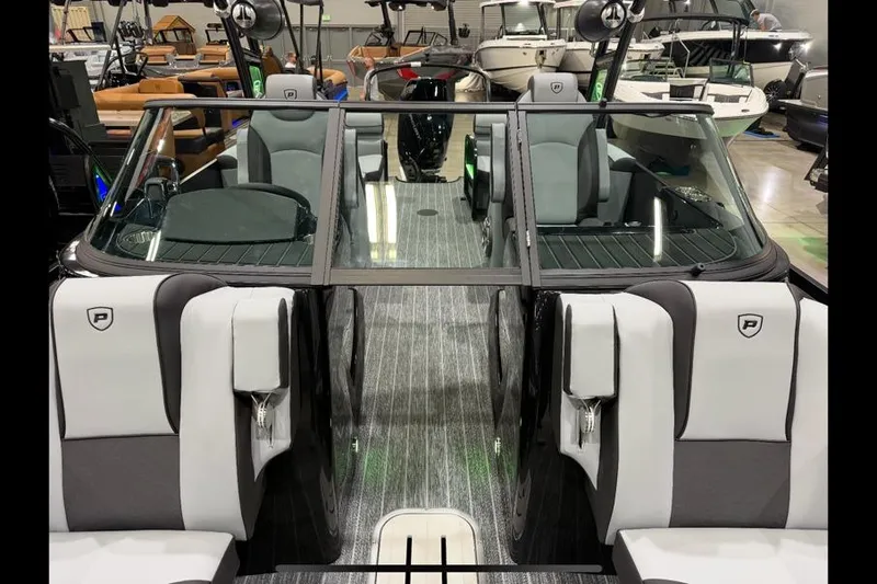 Slide: The Image of 2026 Premier 250 Solaris Sport boat interior with sleek seating and modern design. - 13