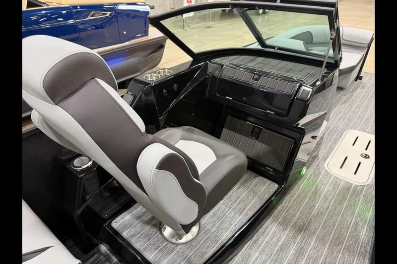 Slide: The Image of 2026 Premier 250 Solaris Sport boat interior with sleek seating and modern dashboard design. - 15