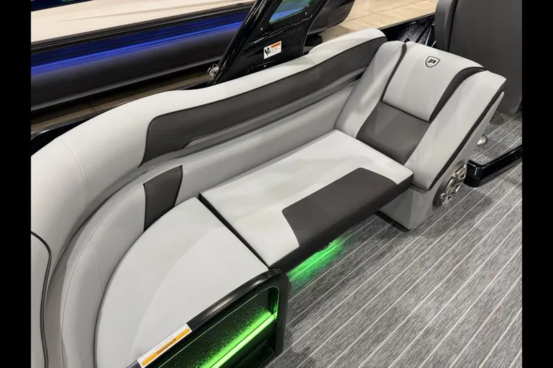 Slide: The Image of Luxurious seating on 2026 Premier 250 Solaris Sport boat with modern design and ambient lighting. - 17