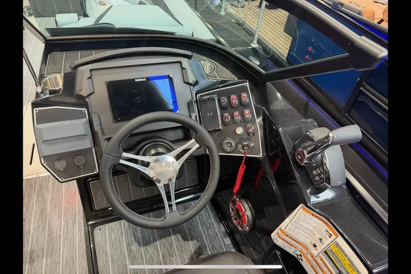 Slide: The Image of 2026 Premier 250 Solaris Sport dashboard with steering wheel, controls, and display screen. - 4