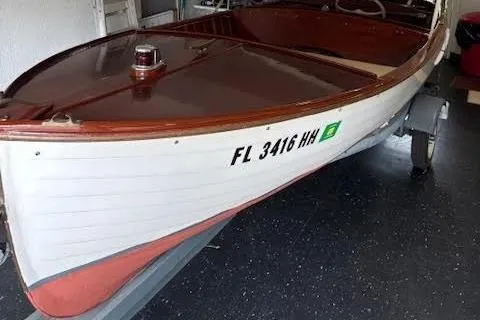 Slide: The Image of 1952 Lyman 15 Classic Runabout boat with registration FL 3416 HH. - 4