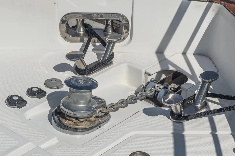 Slide: The Image of Deck equipment on a 2013 Azimut Magellano 50 yacht, featuring cleats and anchor chain. - 11
