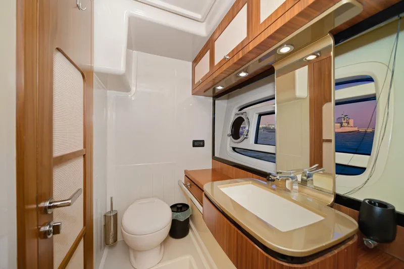 Slide: The Image of Luxurious bathroom interior of 2013 Azimut Magellano 50 yacht with modern fixtures and ocean view. - 28