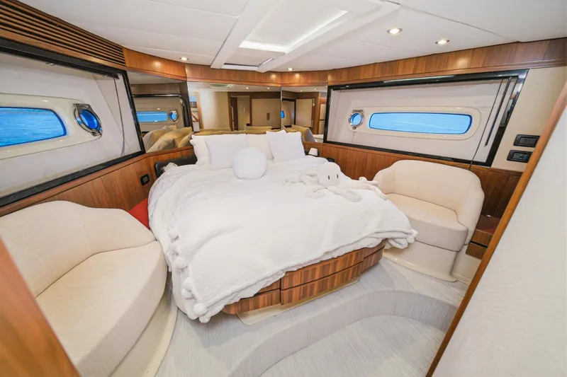 Slide: The Image of Luxurious bedroom interior of 2013 Azimut Magellano 50 yacht with elegant furnishings. - 29