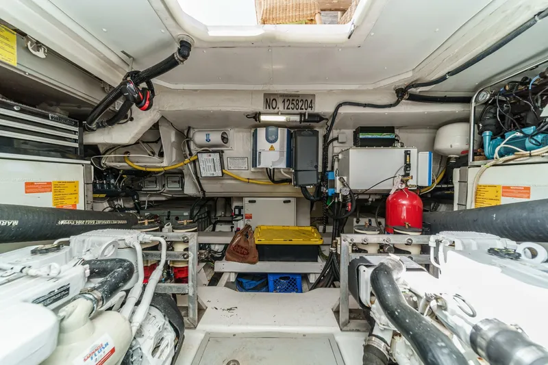 Slide: The Image of Engine room of 2013 Azimut Magellano 50 yacht, featuring mechanical and electrical systems. - 40