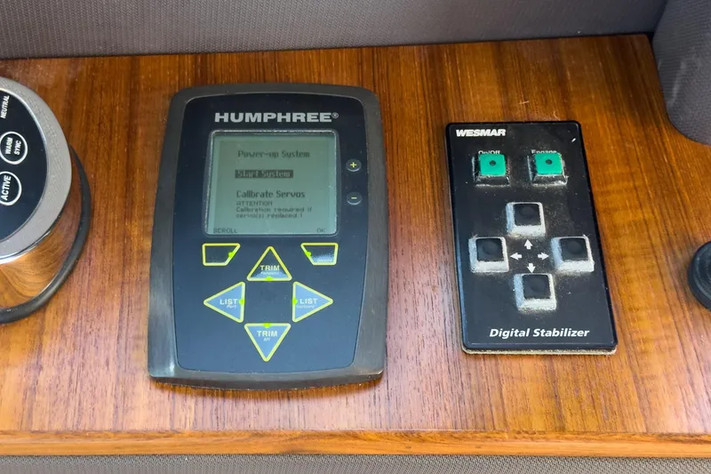 Slide: The Image of Control panels on 2013 Azimut Magellano 50 yacht, featuring Humphree and Wesmar systems. - 42