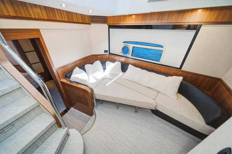 Slide: The Image of Luxurious interior of 2013 Azimut Magellano 50 yacht with plush seating and elegant design. - 47