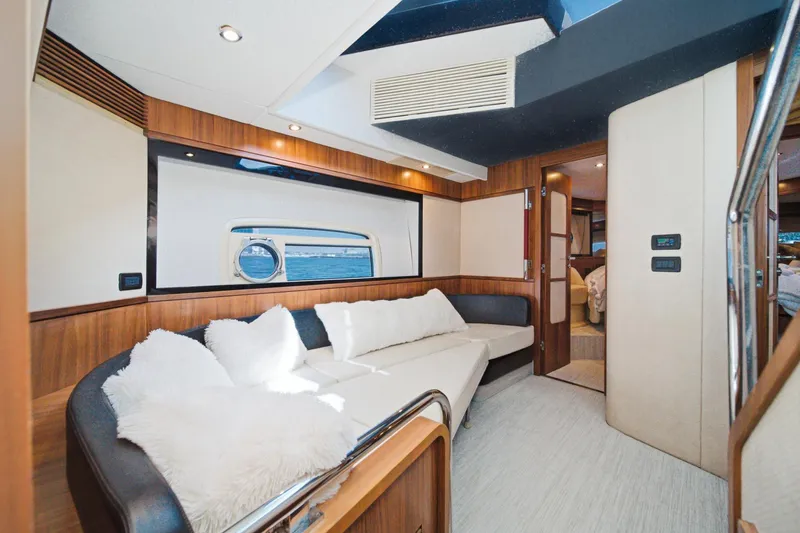 Slide: The Image of Luxurious interior of 2013 Azimut Magellano 50 yacht with plush seating and modern design. - 51