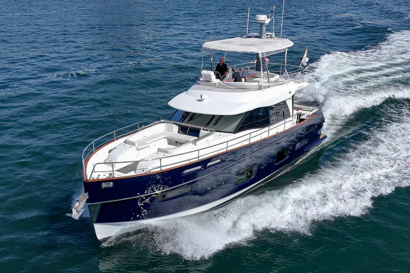 Slide: The Image of Azimut Magellano 50 yacht cruising on open water, 2013 model. - 56
