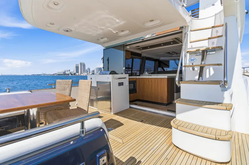 Slide: The Image of Luxurious 2013 Azimut Magellano 50 yacht interior with ocean view and city skyline. - 69
