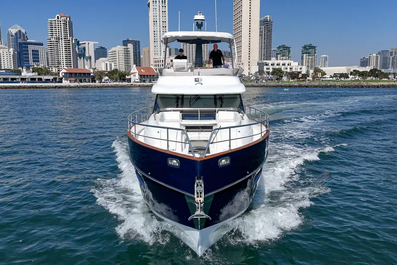Slide: The Image of Azimut Magellano 50 yacht cruising near city skyline, 2013 model. - 75