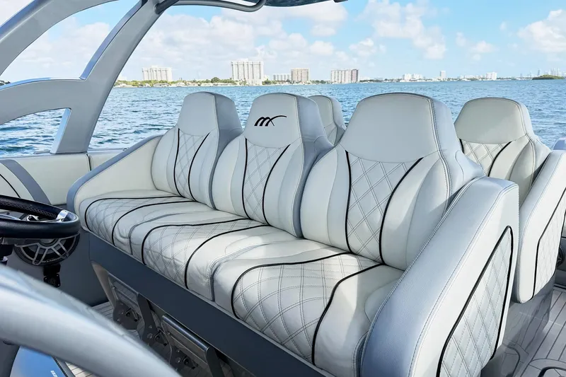 Slide: The Image of Luxurious seating on a Midnight Express 43 Open boat with ocean view. - 13