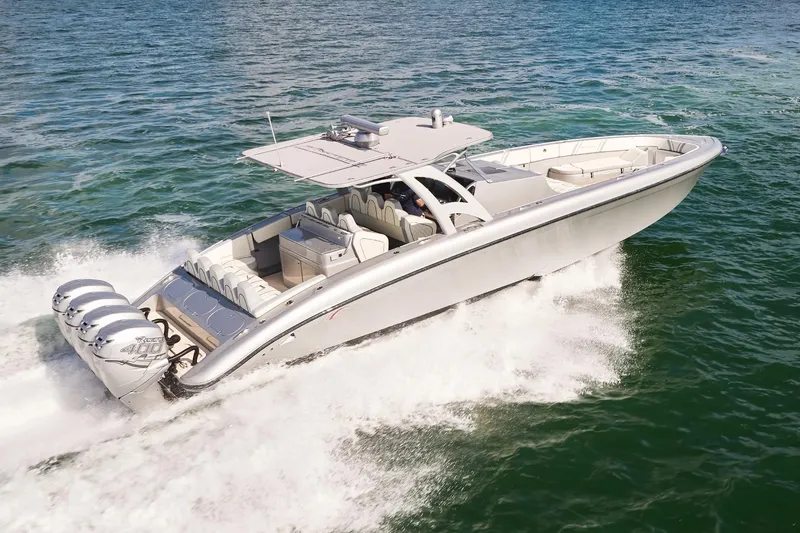 Slide: The Image of Midnight Express 43 Open boat cruising on open water with powerful engines. - 2