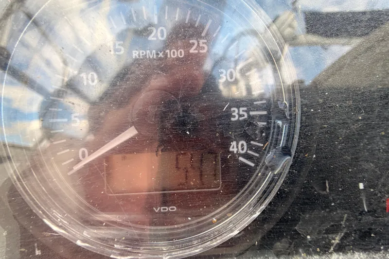 Slide: The Image of Close-up of a Catalina 34 tachometer, showing RPM readings. - 10
