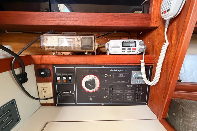 Slide: The Image of Electrical control panel on a 1989 Catalina 34 yacht with radio equipment. - 27