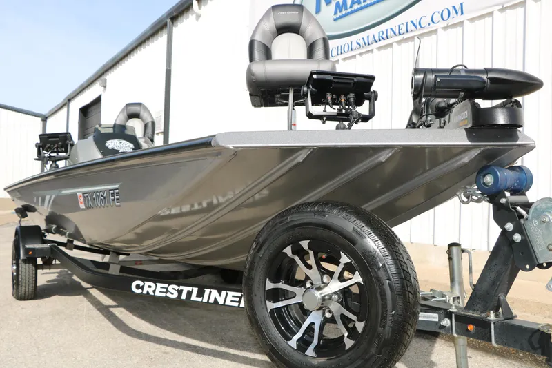 Slide: The Image of 2019 Crestliner VT 18 fishing boat on trailer, featuring sleek design and modern equipment. - 10